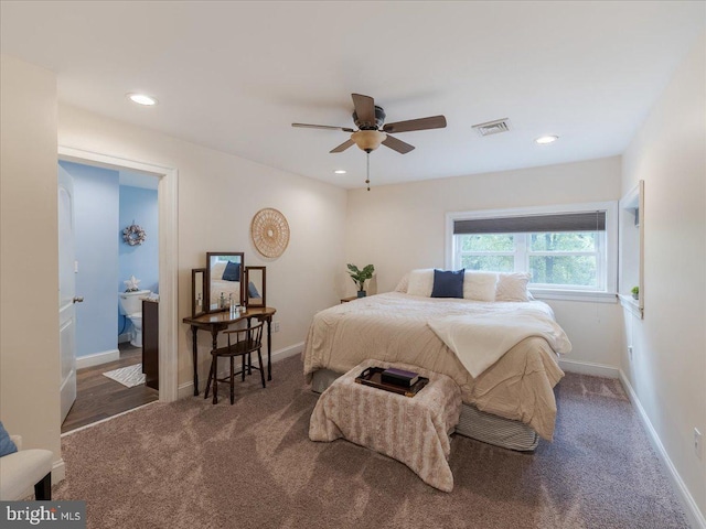 carpeted bedroom featuring connected bathroom and ceiling fan