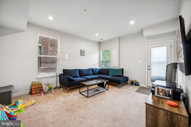 living room featuring light colored carpet