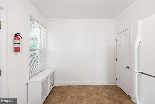 interior space featuring crown molding