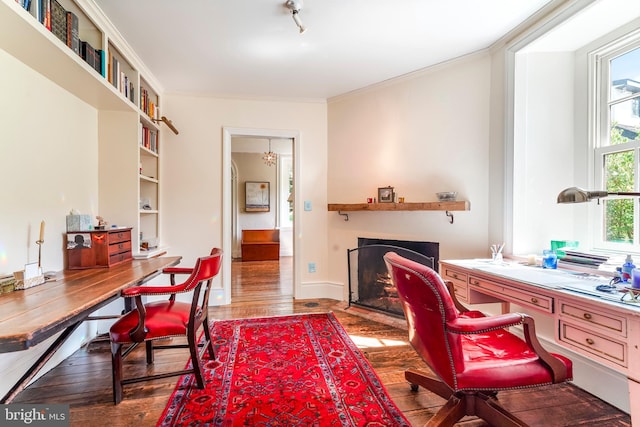 office space with ornamental molding and hardwood / wood-style floors