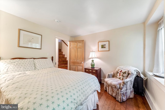 bedroom with wood-type flooring