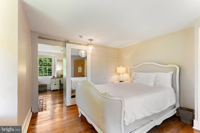 bedroom with light wood-style floors