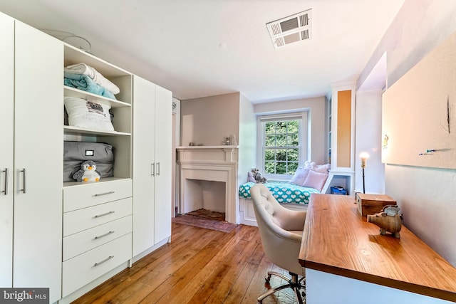 home office featuring light hardwood / wood-style flooring