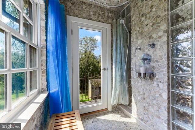 bedroom with french doors, light wood-type flooring, ceiling fan, and access to outside