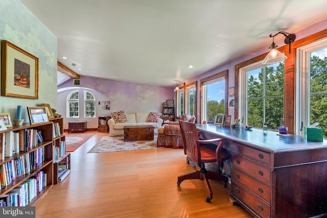 office space with lofted ceiling with beams, light wood-style flooring, and recessed lighting