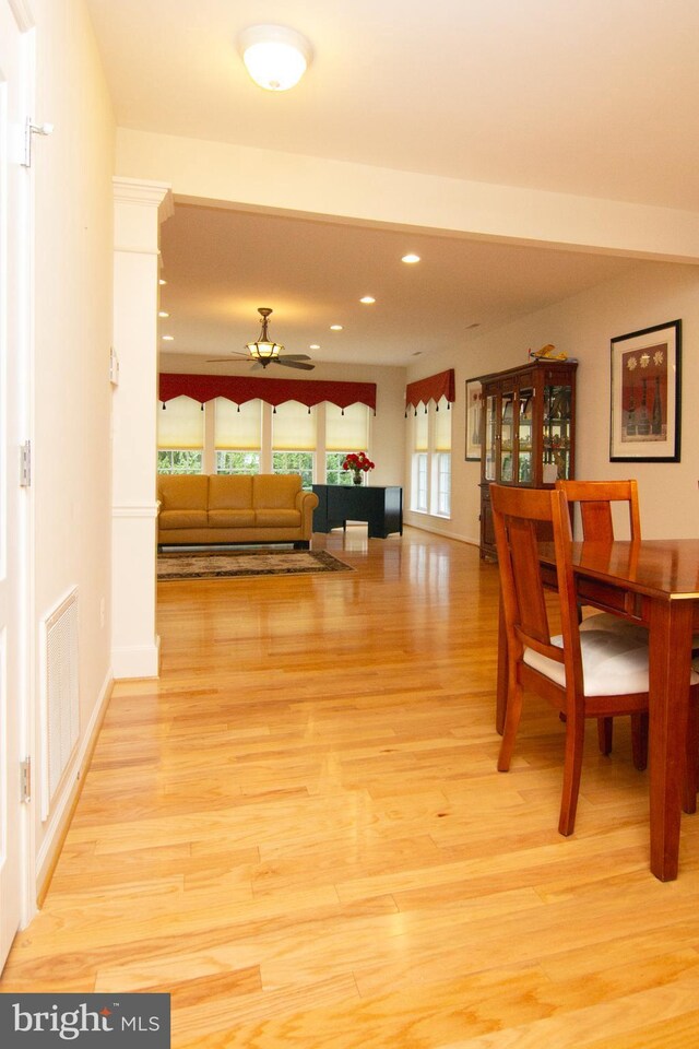 dining area featuring light hardwood / wood-style flooring and ceiling fan