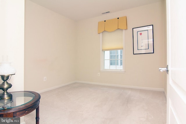 unfurnished room featuring carpet floors