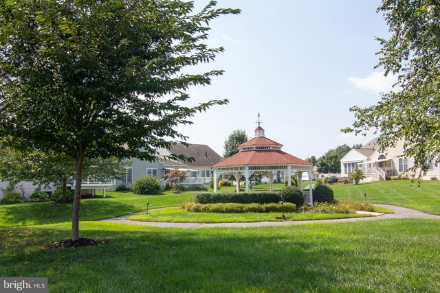 view of community featuring a yard and a gazebo