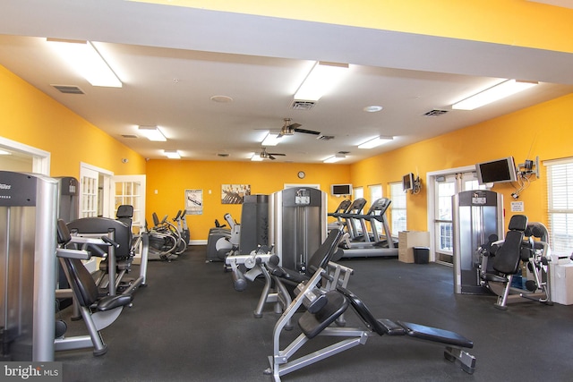 workout area featuring ceiling fan and visible vents