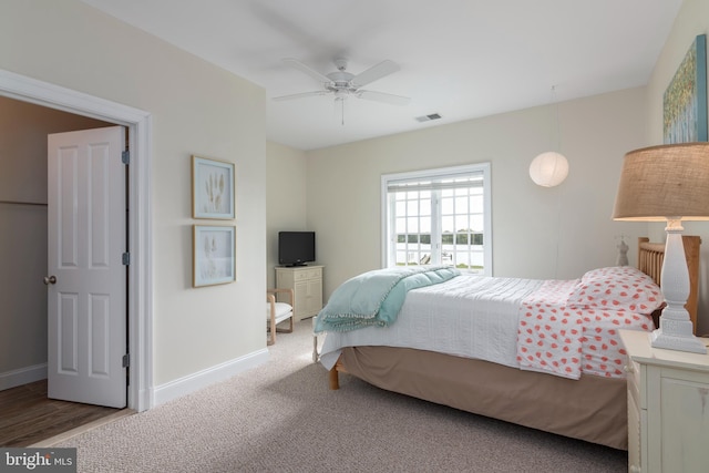 bedroom featuring ceiling fan and carpet floors