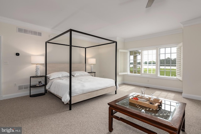 bedroom with light carpet, ceiling fan, and ornamental molding