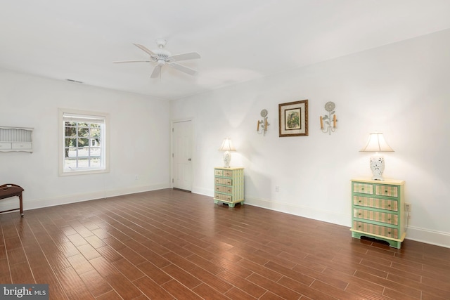 unfurnished living room with ceiling fan