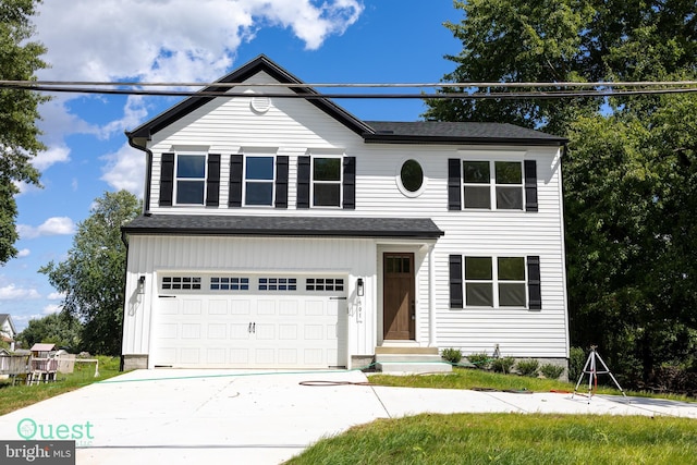 view of front facade featuring a garage and driveway