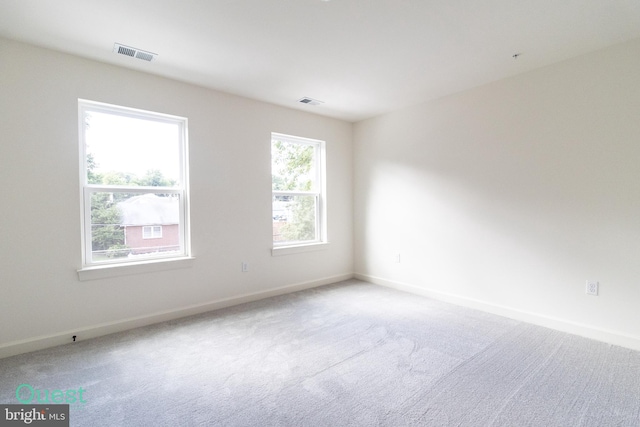 view of carpeted spare room