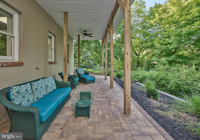 view of patio with an outdoor hangout area and ceiling fan