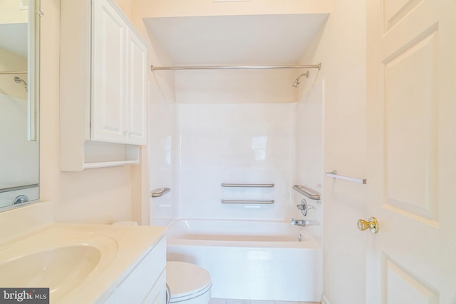 full bathroom with tile patterned flooring, toilet, washtub / shower combination, and vanity