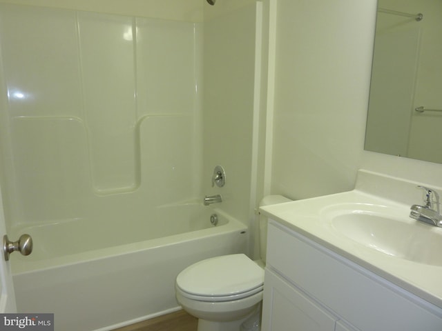 full bathroom with bathtub / shower combination, vanity, and toilet