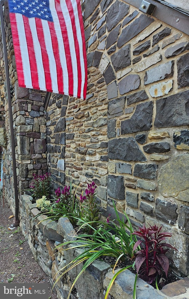 exterior details with stone siding