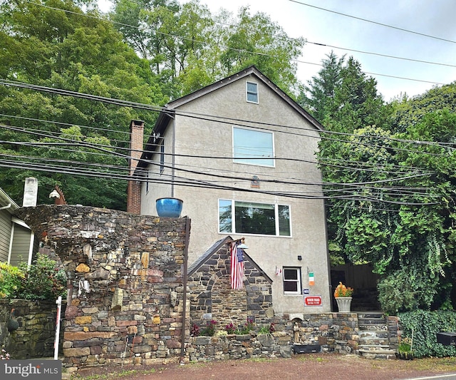 view of front of house with stucco siding