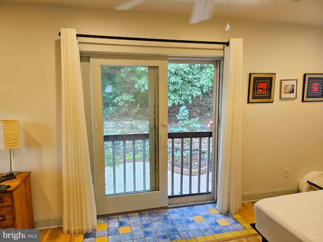 doorway to outside with plenty of natural light and light hardwood / wood-style floors