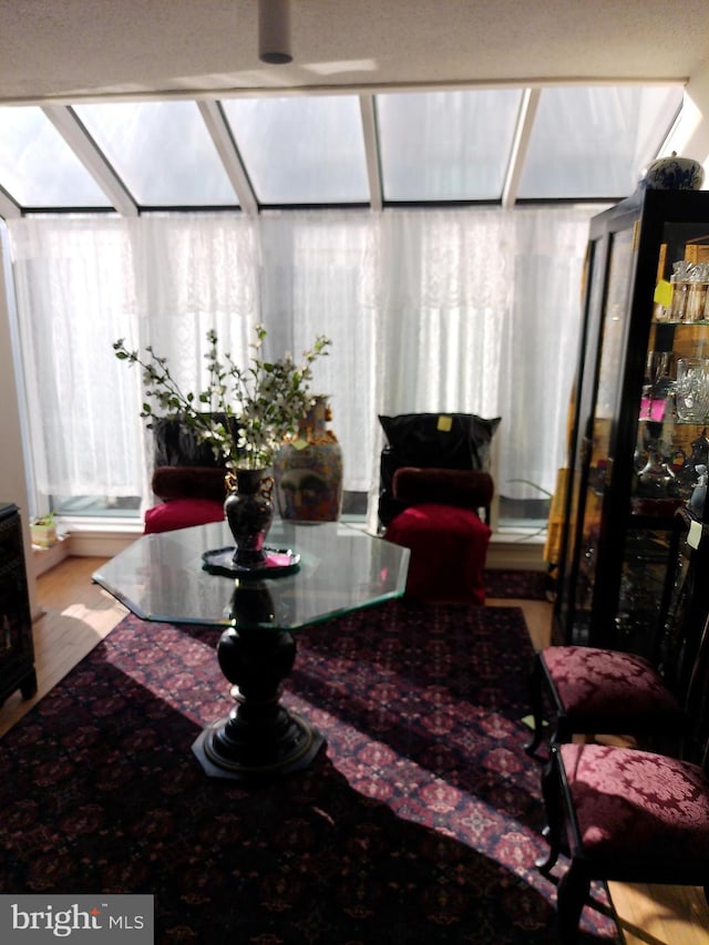 dining room with hardwood / wood-style flooring