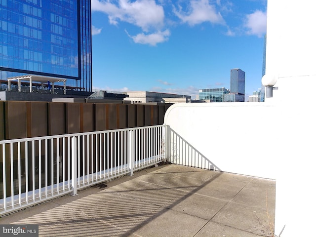 view of patio with a balcony