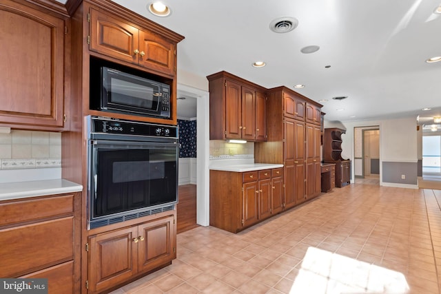 kitchen with black appliances