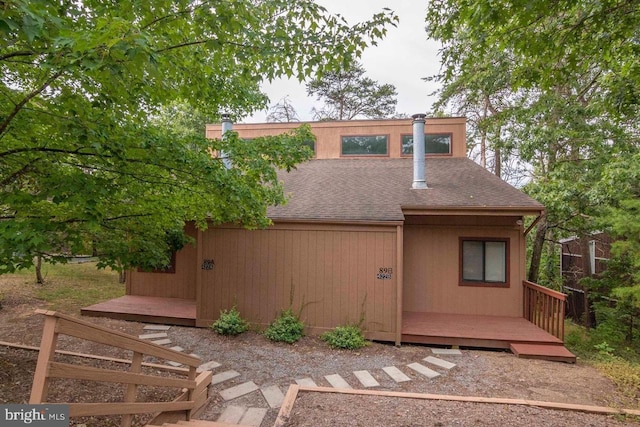 exterior space with a wooden deck