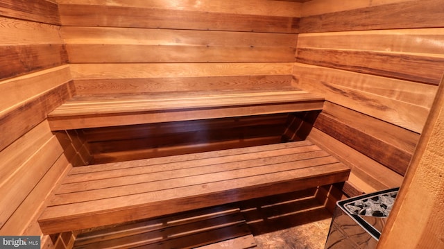 view of sauna / steam room with wood walls