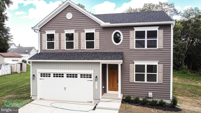 traditional-style home with a garage, driveway, a shingled roof, and a front yard