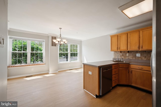 kitchen with a peninsula, a sink, light wood finished floors, dishwasher, and tasteful backsplash