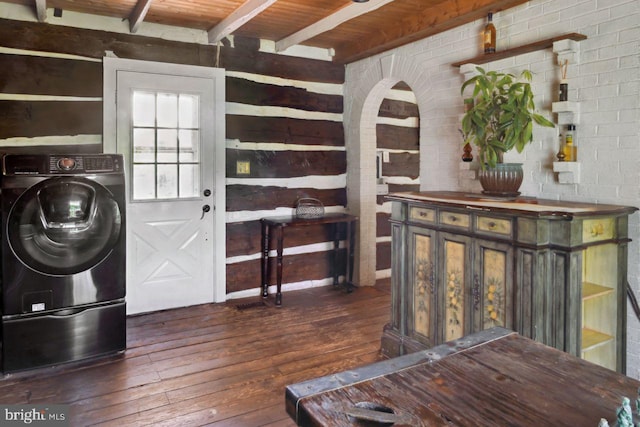 laundry room with dark wood-type flooring, washer / dryer, and wooden ceiling