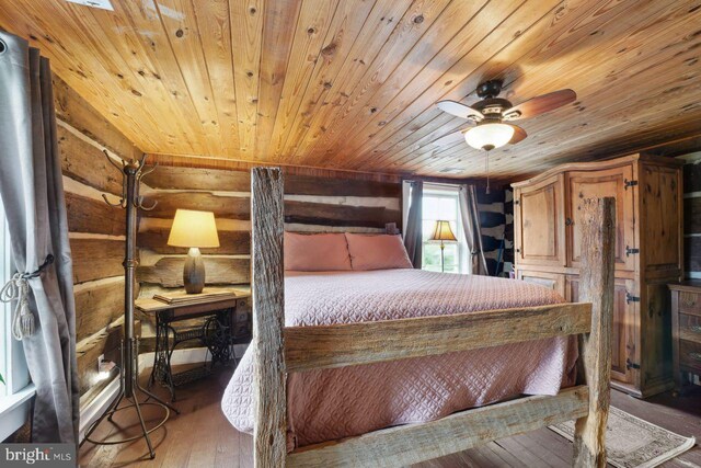 bedroom with wood ceiling and hardwood / wood-style flooring