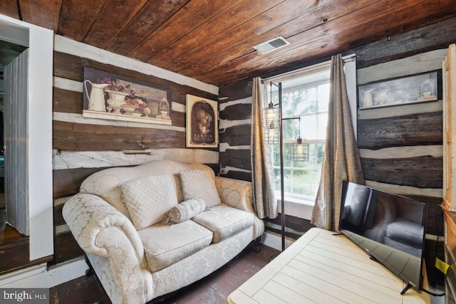 living room featuring dark wood-type flooring and wooden ceiling