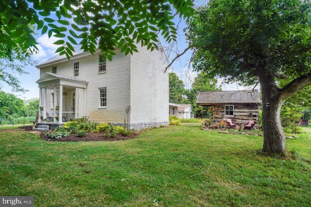 exterior space with a yard