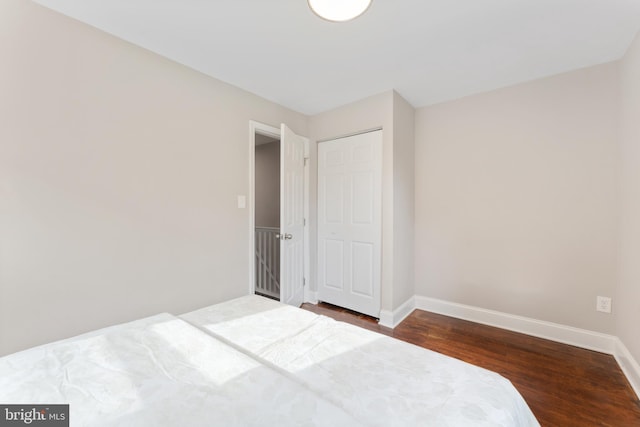 bedroom featuring wood-type flooring