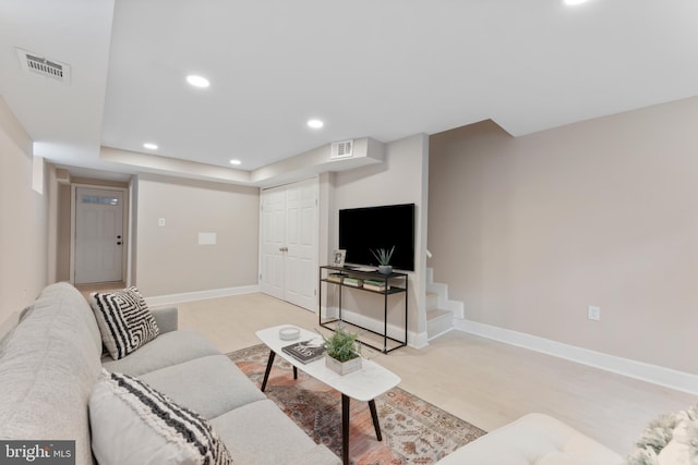 living room with light carpet