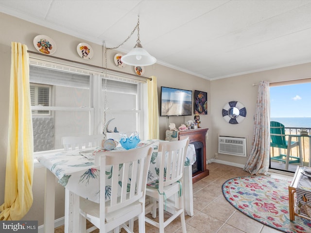 tiled dining area featuring baseboards, a wall mounted air conditioner, and crown molding