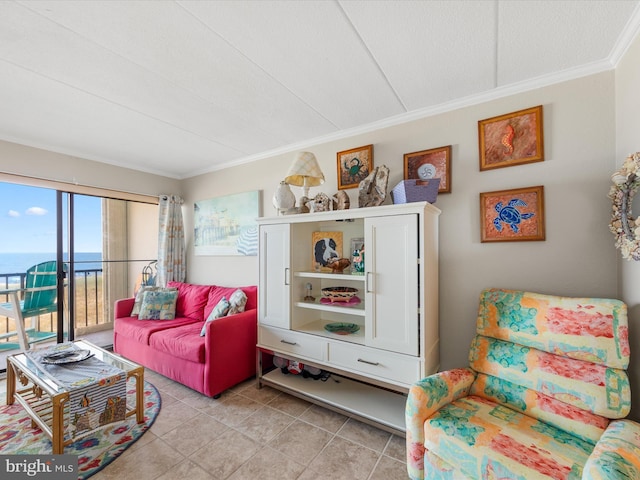 living room featuring a water view, crown molding, and light tile patterned flooring