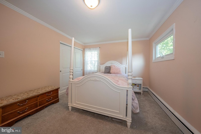 bedroom featuring a baseboard heating unit, carpet, and crown molding