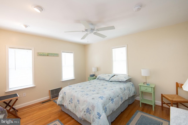 817 Seabreeze Rd, Cambridge, MD 21613 - bedroom featuring baseboards, light wood-type flooring, and a ceiling fan