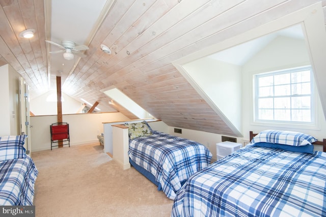 817 Seabreeze Rd, Cambridge, MD 21613 - bedroom with wood ceiling, carpet floors, baseboards, and lofted ceiling