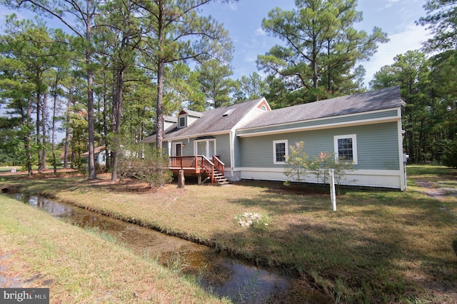 817 Seabreeze Rd, Cambridge, MD 21613 - view of front facade with a front lawn and a deck