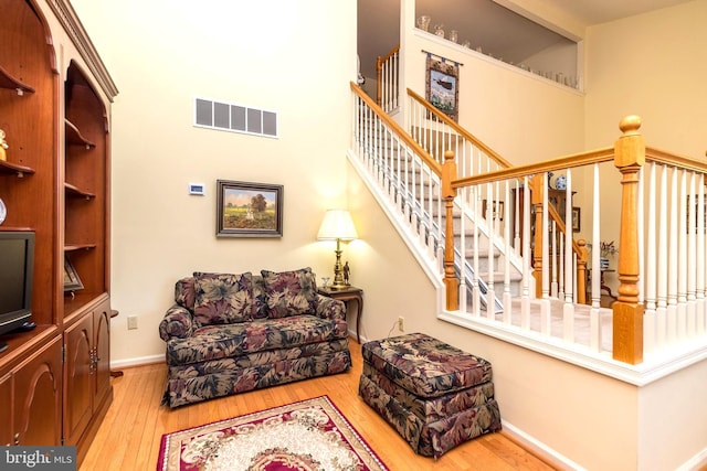 living room with light hardwood / wood-style floors