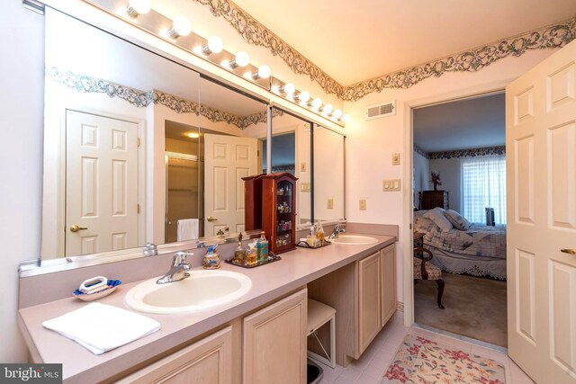 bathroom featuring vanity and tile patterned floors