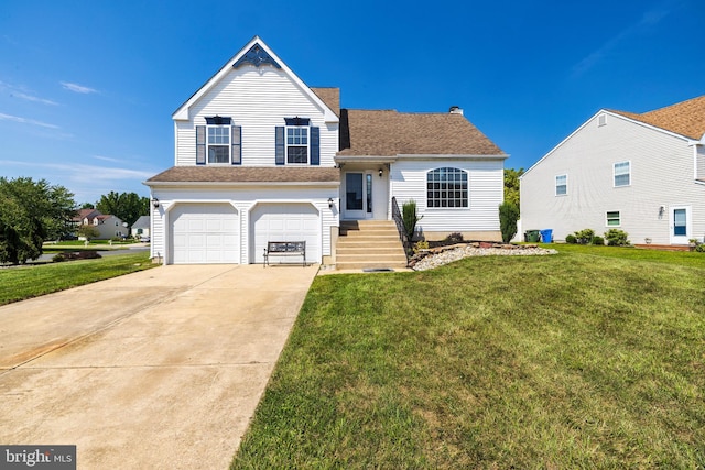 view of front facade featuring a garage and a front yard