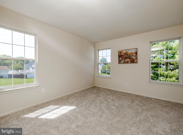 view of carpeted spare room