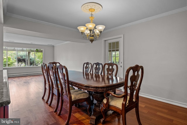 dining area with crown molding, baseboard heating, dark wood-type flooring, and a notable chandelier