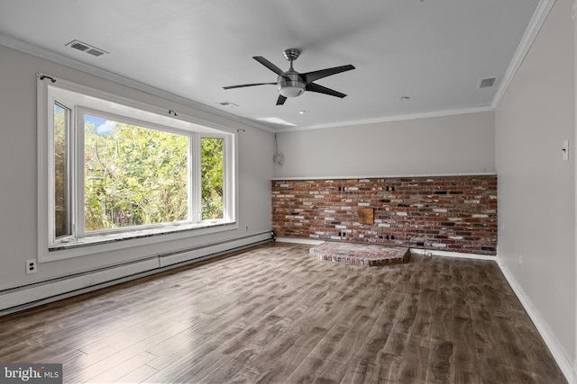 spare room with baseboard heating, hardwood / wood-style floors, crown molding, ceiling fan, and brick wall