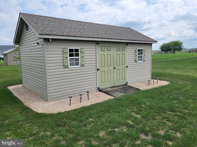 view of outbuilding with an outbuilding